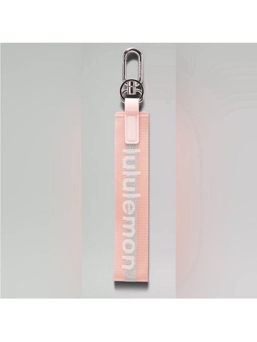 Lululemon Pink, Silver, and White Never Lost Keychain